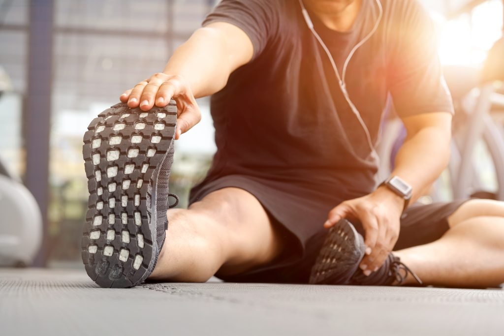man stretching before workout
