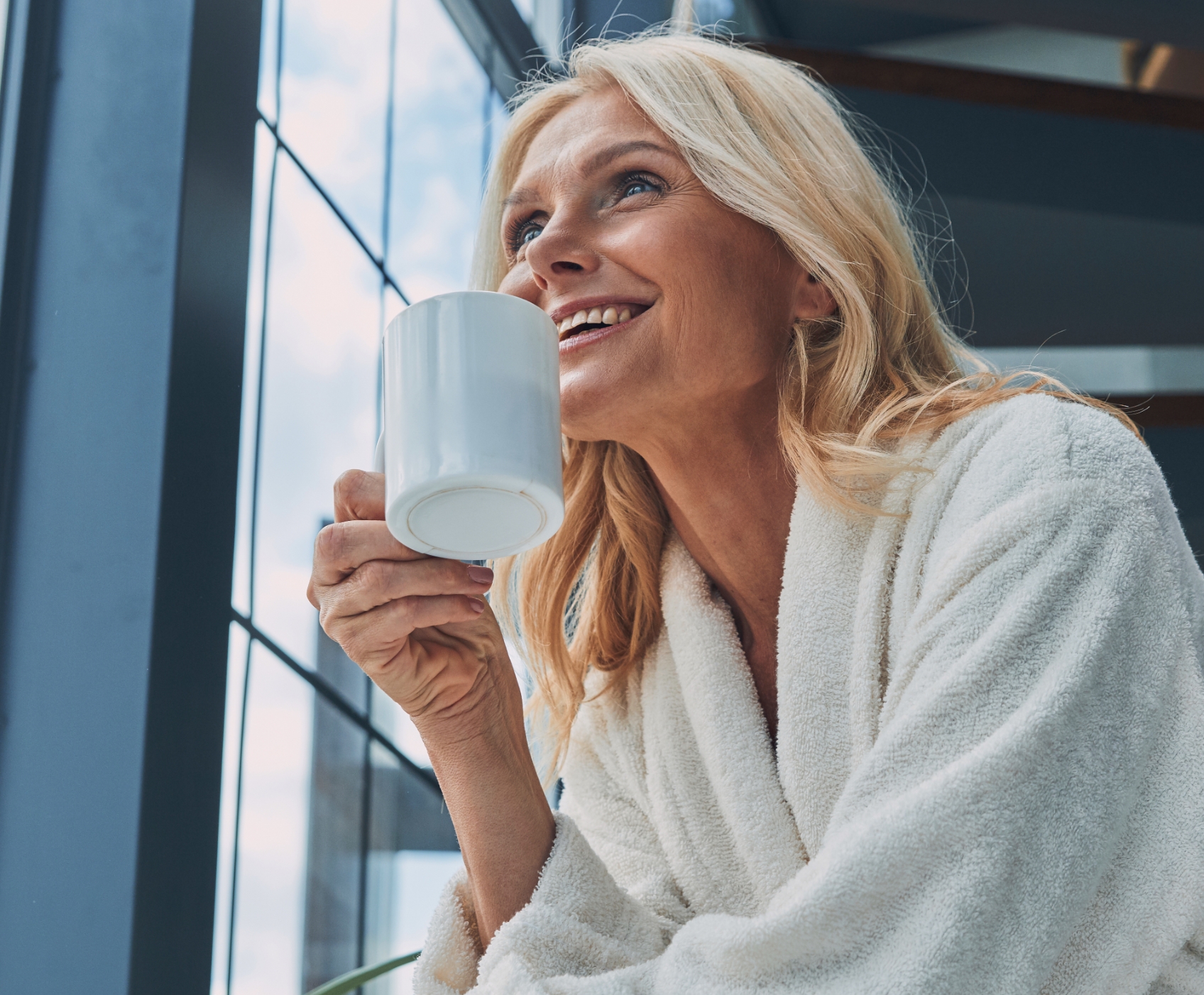 Woman sipping coffee